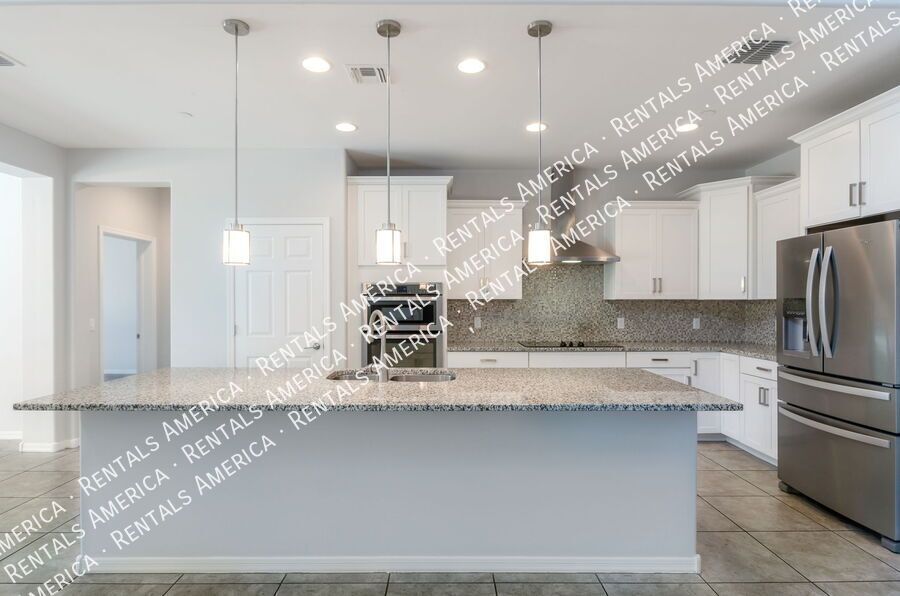 Spacious 4BR + Office Home w/ Den & Turf Yard Near Community Pool property image