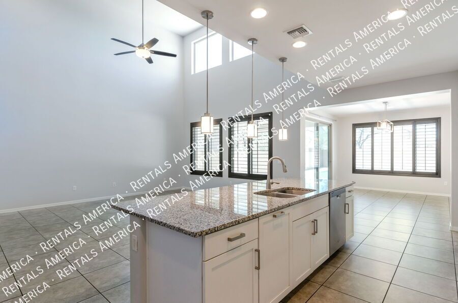Spacious 4BR + Office Home w/ Den & Turf Yard Near Community Pool property image