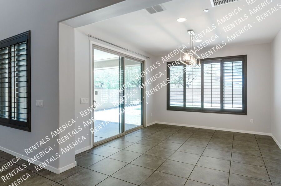 Spacious 4BR + Office Home w/ Den & Turf Yard Near Community Pool property image