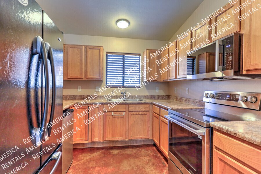 Spacious 4-bedroom, 2-bath home with fenced in yard. property image