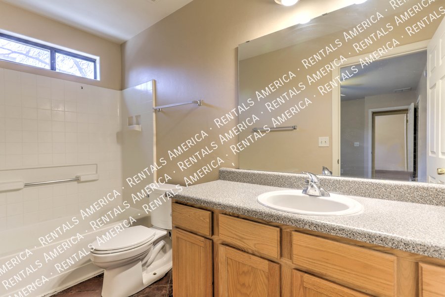 Spacious 4-bedroom, 2-bath home with fenced in yard. property image