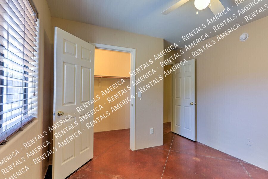 Spacious 4-bedroom, 2-bath home with fenced in yard. property image
