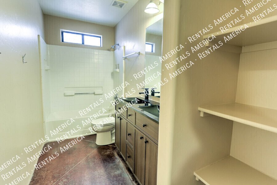 Spacious 4-bedroom, 2-bath home with fenced in yard. property image