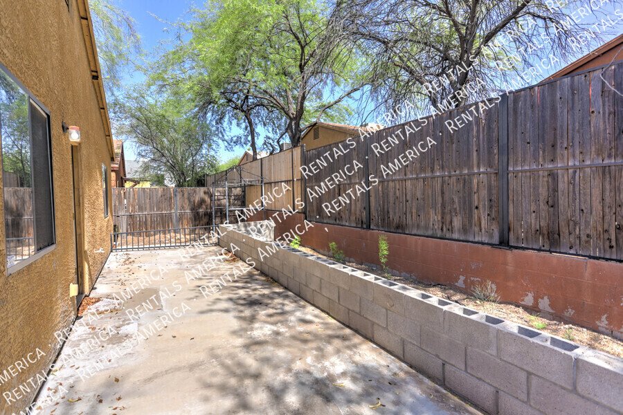 Spacious 4-bedroom, 2-bath home with fenced in yard. property image